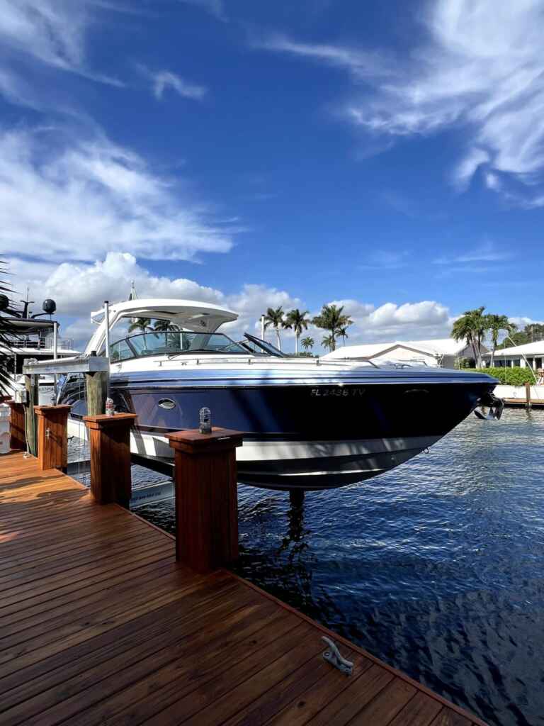 4 post boat lift with a bowrider in fort lauderdale.