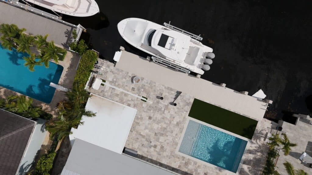 Aerial view of a center console on a 4-post boat lift.