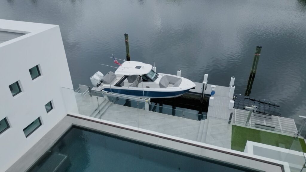 View from above of a dual console boat on a 4-post boat lift.