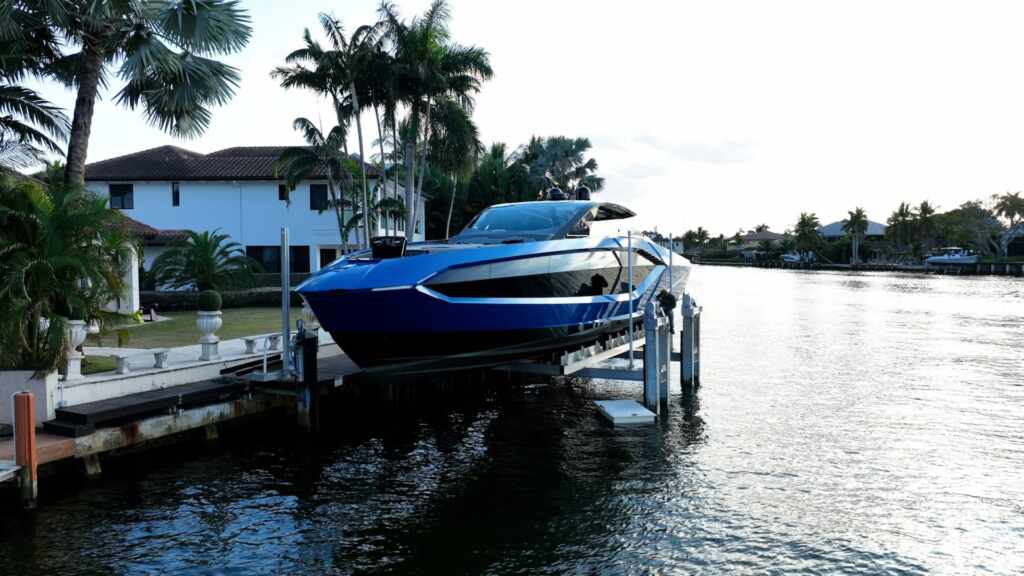 8 post boat lift with a lamborghini yacht in fort lauderdale.