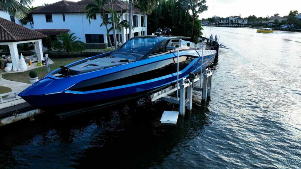 8 post boat lift with a lamborghini yacht in fort lauderdale side view.