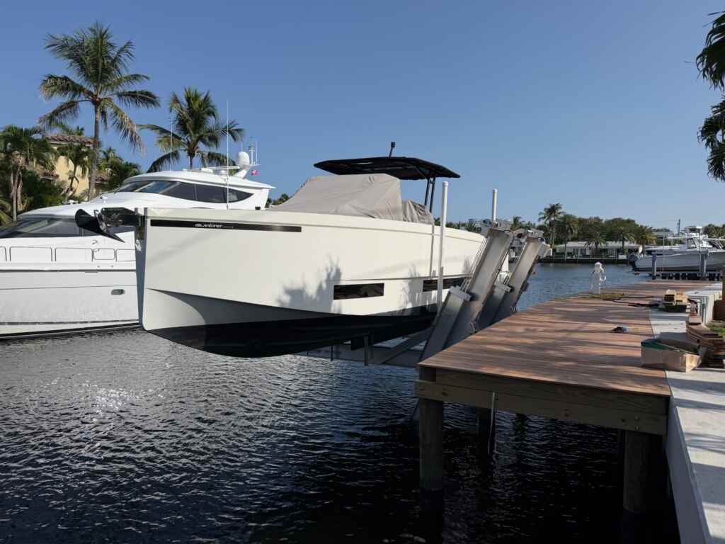 Elevator boat lift with a cruiser in fort lauderdale.