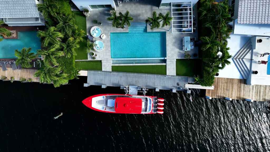 Elevator boat lift with a performance boat aerial.