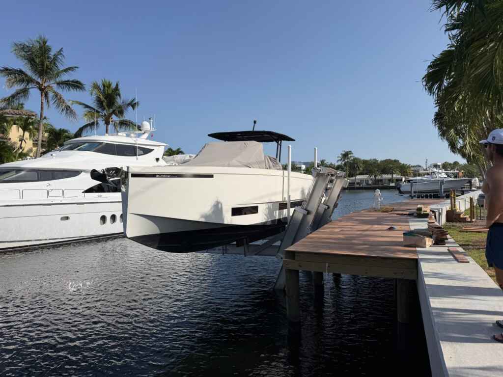 Wood dock with cruisers in fort lauderdale.